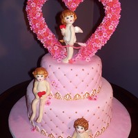 Cupid's Folly Cupids are made from gumpaste and painted with extract and petal dust. This cake was made for my daughter's class.She made the fondant...
