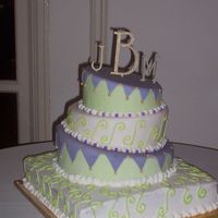 April Fools Wedding Cake This cake was done by me and my cakebuddy, Twin. The top three tiers are dummies, covered in fondant and the bottom tier is a vanilla...