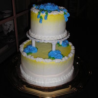 Anniversary Cake Raspberry filled white cake with buttercream. Airbrushed the gold color on and buttercream flowers and leaves