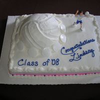 Lindsay's Cake This was a graduation for the daughter of a friend. It was a marble cake with buttercream frosting. She is going to college on a volleyball...