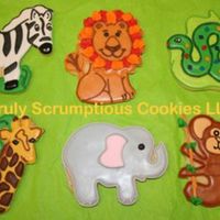 Jungle Animals When I come up with designs, I look at stickers, stock photos, rubber stamps, etc for ideas. These took forever! The lion design was...