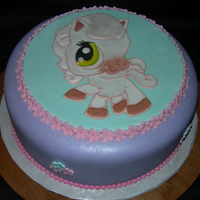 Littlest Pet Shop This was the first time I tried this techinique. The lady that ordered it seen it on cakejournals flickr site. I learned a lot and it will...