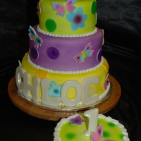 First Birthday With Smash Cake! The bottom tier and the Smash Cake are chocolate with buttercream, the other two tiers are white cake with buttercream. The 3 tier is...