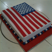 American Flag Cake Chocolate cake with mousse filling covered in fondant with fondant decorations. Thanks for all the inspiration in the galleries, especially...