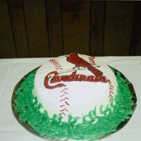 Cardinals Baseball This is a strawberry cake with BC icing. Cardinal is royal icing. This is the first time i have use royal icing. This was my cousins grooms...