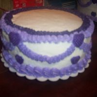 Round Double Layer Cake With Handmade Candy Hearts This is one Tier of a Wedding Cake I made. I thought this would make a Very Pretty Birthday Cake or cake for other occassions.The hearts I...
