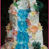 Caroline's Luau Birthday Cake was made to copy a photo of a cake the birthday girl found. Buttercream icing with fondant gumpaste and fondant flowers &...