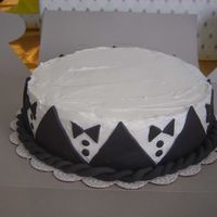Tuxedo Cake Bride picked out design (online) but wanted it to be surprise for the wedding.Inside it was butter recipe cake with strawberry whipped...