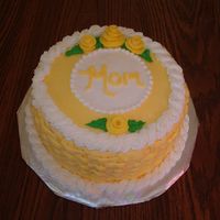 Mom's Birthday Cake White cake w/ cannoli filling from the Cake Mix Doctor Book. All buttercream frosting with Duff's Fondant Roses.