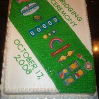 Girl Scout Sash Cake I made this cake for my daughter's Jr. Girl Scout Troop's bridging ceremony using the troop sash as a model for the cake. I &quot...