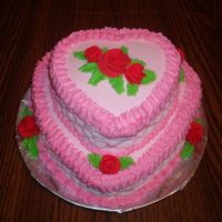 Valentine's Heart Cake White Almond Sour Cream cake with buttercream frosting. The roses are fondant. This was my first attept at basetweave since I took Wilton 2...
