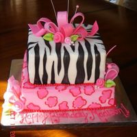 Girly Animal Print Birthday Cake Pink leopard print and zebra print cake made for 11 year old birthday girl.