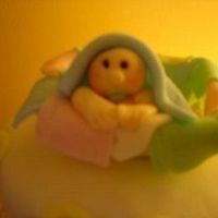 Clothesline Cake Baby Topper A close-up of my cake topper