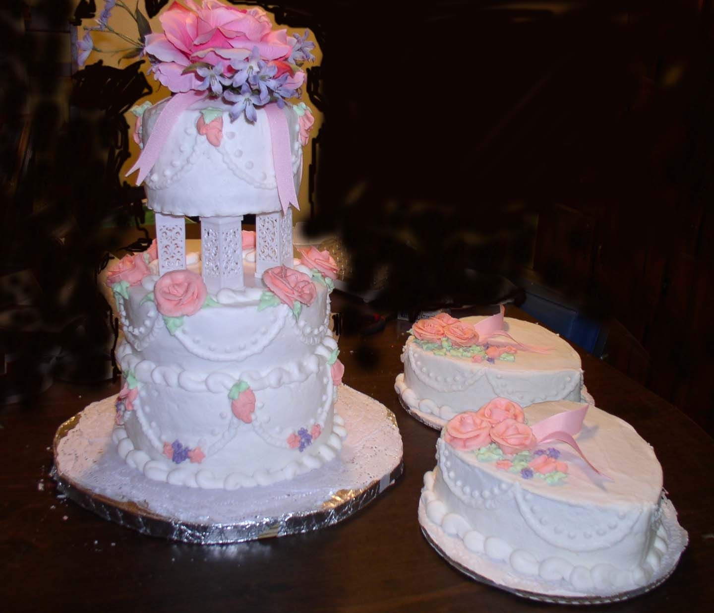 Pink Buttercream Roses And Royal Icing Drop Flowers This cake is 10 inch double layer with 8 inch double layer right on top of that, separated with a small 6 inch double layer. I finished the...