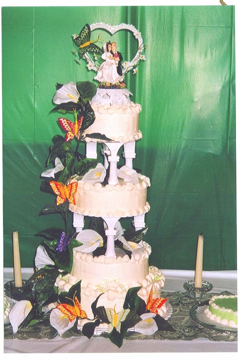 Butterflies And Lillies This is the first cake I made in 20 years. It was for my daughters wedding 3 years ago.