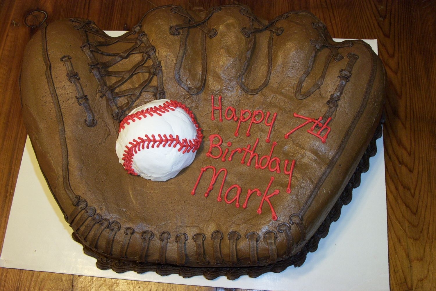 Baseball Glove Cake done in chocolate buttercream. The ball is a huge mound of buttercream!