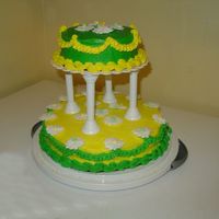 Final Wilton Cake Buttercream icing, and swags, royal icing daisies. Made cake as a going away gift to our babysitter who cared for my girl from six weeks...