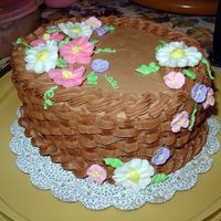 Basket Cake chocolate buttercream, royal icing flowers. final cake made in Wilton II class...start Wilton III next week, Yaay !