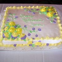 Joan's Retirement Cake Pastry Pride Frosting, lemon filling, royal icing flowers, my first time at flipping a 1/2 sheet - next time, I'll use a cake board...