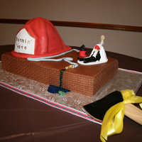 Burnin' Love the bride said she wanted the topper on the groom's cake. He was a volunteer fireman. He had a dog. They are man's bestfriend. I...