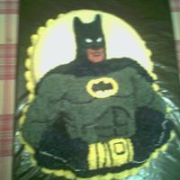 Batman Cake This is a cake I made for my husband's birthday. The cake is a regular yellow cake with buttercream icing.