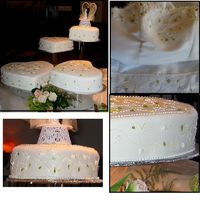 Crystal Beads Look On Wedding Cake The bride could not decide what she wanted her cake to look like. She had purchased a wedding gown, so we decided to make the cake match...