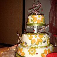 Wedding Cake this is a wedding cake that i made for my friends, flower using fondant and in the middle using piping gel.