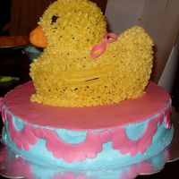 Rubber Duckie Baby Shower Cake I used the 3d duckie pan, first cake i made with the pan i took it out too early and had to make another cake . The duck is cover in...