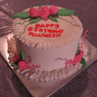 Pink Roses This is a Chocolate WASC Cake with chocolate ganache filling, and almond flavor buttercream frosting. (It's 8-inch, 4 layers, 4 1/2...