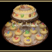 Boy/girl Baby Cake And Cupcakes 6" round with 18 matching cupcakes... Baby is sculpted of fondant and has handpainted details... All toppers on cupcakes and baby...