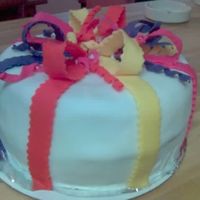 My First Attempt With Fondant I made this for my friends birthday. This was the very first attempt with fondant. I hope to get better