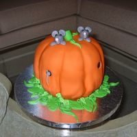 Halloween Mice Spice cake pumpkin covered in fondant with fondant mice.