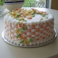 Spring, Fall, Thanksgiving Buttercream frosting with royal icing flowers.