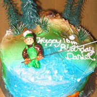 Fly Fisherman Cake This was for a friend who's son loves fly fishing. The fish is my attempt at a trout LOL... I see you guys... stop laughing!....