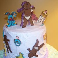 Oh Baby (Pic #2) This is a closer look at some of the chocolate transfers used on my 'Oh Baby' cake. Patterns are from 'The Whimsical...