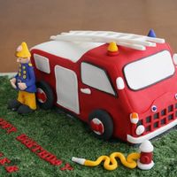 Fireman Sam Cake Character cake for Asher adapted from Debbie Brown.