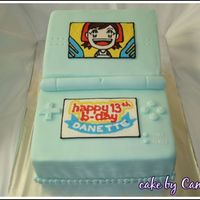 Nintendo Ds Cake I made for my cousin in Mar 08. First time trying FBCT - the picture of Mama came out well but my attempt on turning the logo into the...