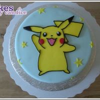 I Choose You, Pikachu! All fondant work. And this was a last minute job too! I cut out basic shape and then added the other details afterwards. For the border I...