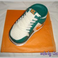 Nike Shoe Nike shoe for my buddy made in Feb 08This was my first real 3D cake. and I was definitely proud of this one. had a lot of help from bdrider...
