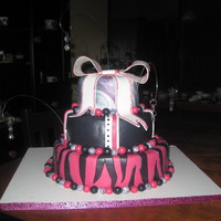 More Pink And Black After seeing the other pink and black cake, a girl wanted me to make her a cake for her 12th birthday. So I did a zebra that she wanted and...