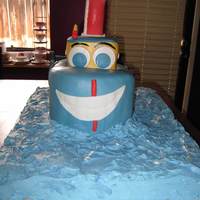 Tugboat Cake Made for a boy's first birthday. Thought a tugboat would be cute to make. Also in some of the pictures is a 6" I was asked to...