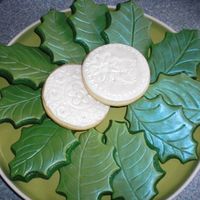 Holly Leaves And White Rounds We did a bunch of holly leaves and a couple white different round designs by my 12 year old daughter!