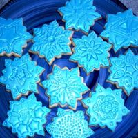 Snowflake Cookies We colored these snowflakes a soft blueand then used blue pearl luster dust on them. My 12 year old daughter did all the detail work on...