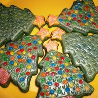 Christmas Tree Cookies! :) Well..this was trial and error night. :) We actually colored the sugar cookie dough before we baked them. I was so excited because I...