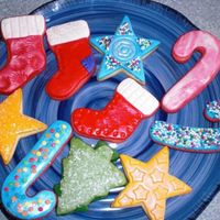 Misc Cookies Stockings Candy Canes Stars Trees Did an assortment of other cookies for this plate. Again, my daughter did most the detail work on these.