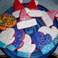 Hat & Mitten Cookies Did a few different types of mittens and santa hats.