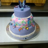 Sweet 16 Cake Covered in fondant and decorated with edible butterflies and pearls that I made using fondant and gumpaste.