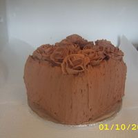 Rough Sides And Roses Cake I decided to leave to edges rough on this one because I was having a horrible time with the icing. These are my first roses, I used a...