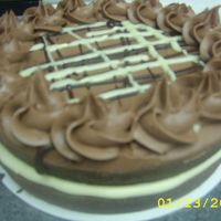 Brownie Cake two layers of brownies baked in my 9 inch cake pans, cream cheese filling in the middle, chocolate buttercream on top drizzled with semi-...