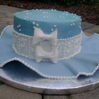 Blue Hat An eight inch cake with a brim made of a fondant gumpaste blend. Thanks for looking!
